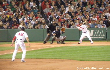 Dustin Pedroia bats as Jacoby Ellsbury takes a lead at first. The Yankees soon found out what happens when you don't pay attention to Ellsbury on the basepaths.