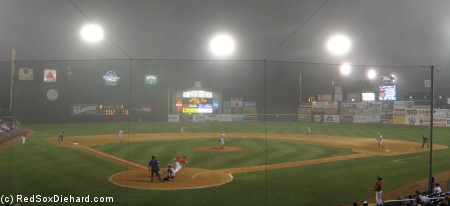 Matt Sheely hits a popup into the fog in the sixth inning.