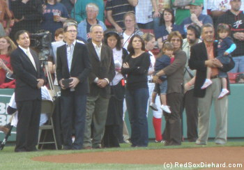 Red Sox owners Tom Werner, John W. Henry, and Larry Lucchino join Nomar's family, including his wife Mia Hamm, their twin daughters, and his parents, Sylvia and Ramon.  (Did you know Nomar is Ramon spelled backwards? Yeah, thought so.)