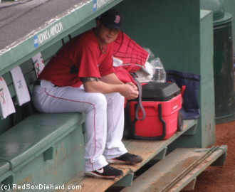 Jon Lester rests in the bullpen after throwing a side session between starts.