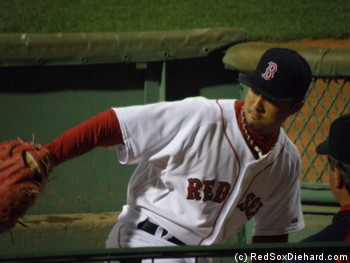 Hideki Okajima warms up in the 'pen. He came into the game in the eighth, but really struggled.
