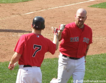 The "Sultan of Sweat" was the only one who could muster some offense on this hot afternoon.  Here, he's congratulated by J.D. Drew after his 9th inning homer.