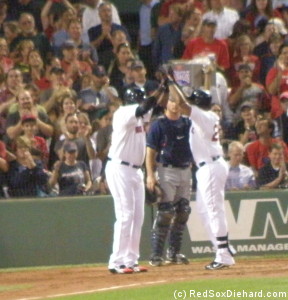 Big Papi congratulates Adrian Beltre after his blast that started the Red Sox' homer barrage.