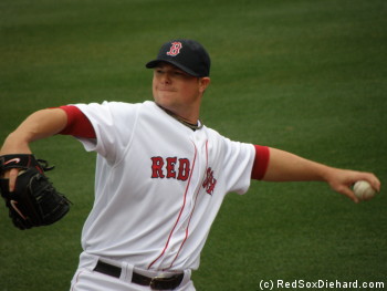 Jon Lester warms up before the game.  He went six innings and picked up the win.