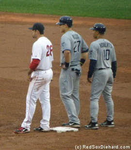 Obligatory shot of Adrian Gonzalez with one of the players traded by the Red Sox to acquire him, Anthony Rizzo. They're joined by Dave "Man of Steal" Roberts, now the first base coach for the Padres.