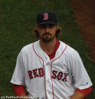 Andrew Miller warms up in the bullpen before the game.