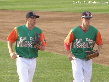 Left fielder Mitch Dening and center fielder Jeremy Hazelbaker jog in at the end of an inning. Dening had a good day at the plate with2 hits and 3 RBI, and Hazelbaker had a good day in the field with a diving catch.