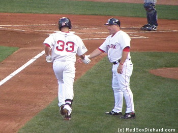 Daniel Nava is congratulated by manager Arnie Beyeler after his first inning home run.