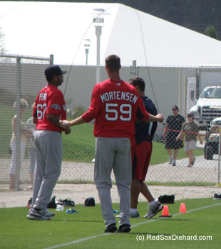 Clayton Mortensen - the pitcher acquired in the Marco Scutaro trade - jumps rope during practice.
