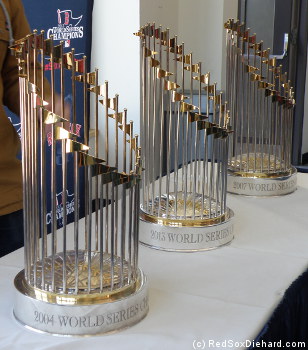 The 2004, 2013, and 2007 World Series trophies were on display in the ticket office.