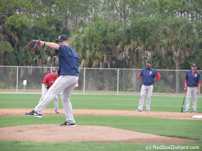 John Farrell took the mound during a baserunning drill.  He was actually just miming throwing the ball.  A coach was hitting fungoes from behind the plate, and then the players practiced running the bases according to the game situations that third base coach Brian Butterfield shouted out.