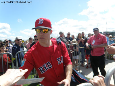 At the end of practice, Mookie Betts and Brock Holt stopped to sign autographs.
