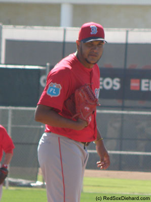 It's Eduardo Rodriguez's turn on the hill during a drill that included the whole team practicing rundowns and cutoffs.