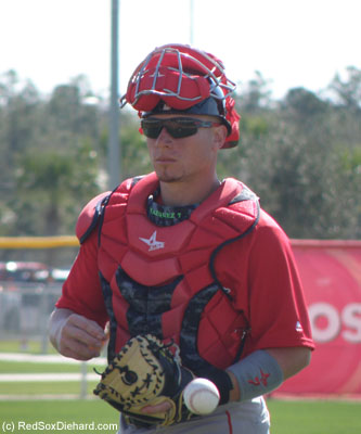 Christian Vazquez is recovering from the Tommy John surgery had had less than a year ago. He's been catching, but he wasn't allowed to practice throwing out baserunners. During the drill he took the role of flipping the ball to the other catchers.
