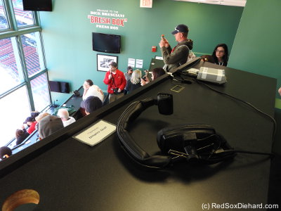 In the press box.  The back row, where we sat, was added in 2007 when the Sox signed Daisuke Matsuzaka, to accomodate all the additional media who followed him around.  I sat next to the "umpire's seat" which I assume has communication to the umpires in New York who preside over replay calls.