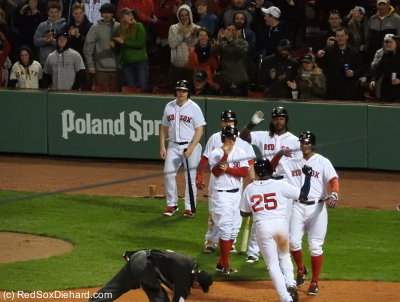 Just how many people were on base for Jackie Bradley Jr.'s grand slam? Half the team is there to greet him at home plate!