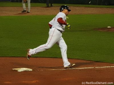 Christian Vazquez rounds third after his game-winning blast.