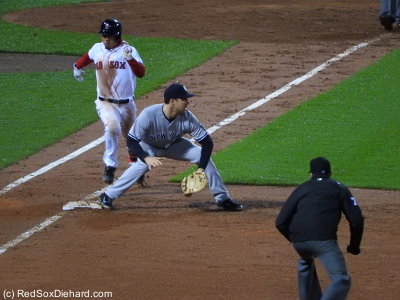 Mookie Betts beats the throw to first and reaches safely on a fielder's choice in the fourth.