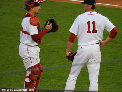Christian Vazquez and Clay Buchholz talk things over on the mound.
