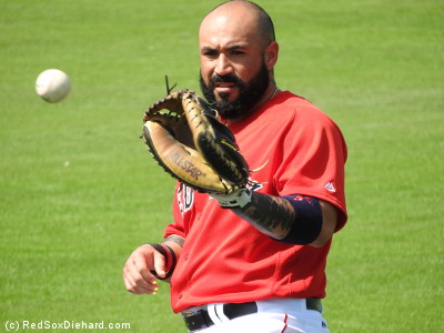 Before the game, Sandy Leon warmed up in front of the bullpen.